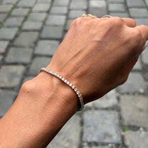 Sarah added a photo of their purchase