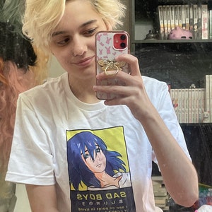 Aaliyah added a photo of their purchase