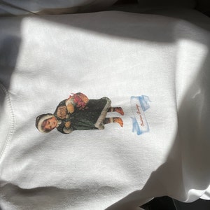 Sarah added a photo of their purchase