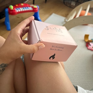 Aisha added a photo of their purchase