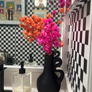 Isabella added a photo of their purchase