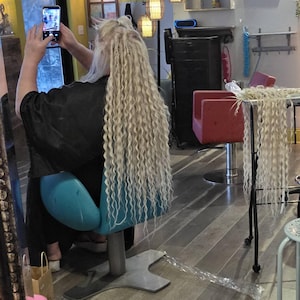 Angela added a photo of their purchase
