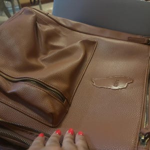 Sherita added a photo of their purchase