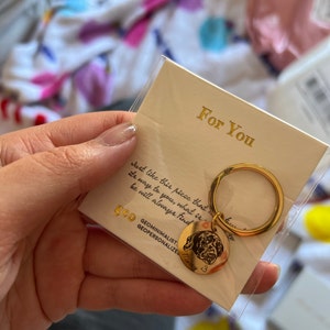 Sarah added a photo of their purchase