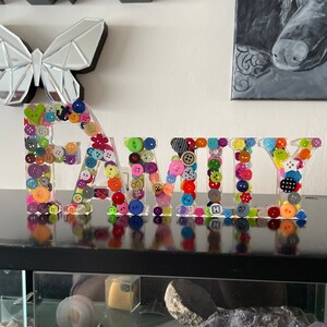 Kym adicionaram uma foto da sua compra