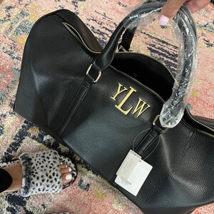 Yasha added a photo of their purchase