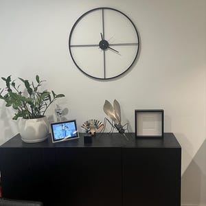 Glenn added a photo of their purchase