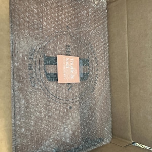 Nicole added a photo of their purchase