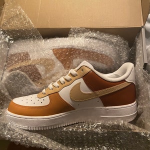 black and brown air force ones