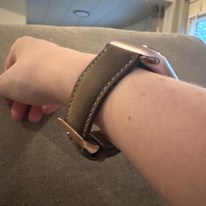 Lizzie added a photo of their purchase