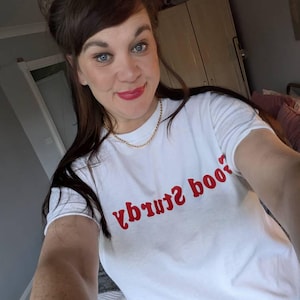Lizzie added a photo of their purchase