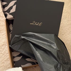 Gigi added a photo of their purchase