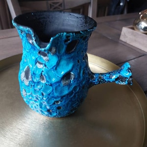 Laurette added a photo of their purchase