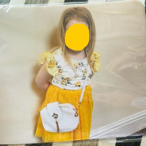 Sarah added a photo of their purchase
