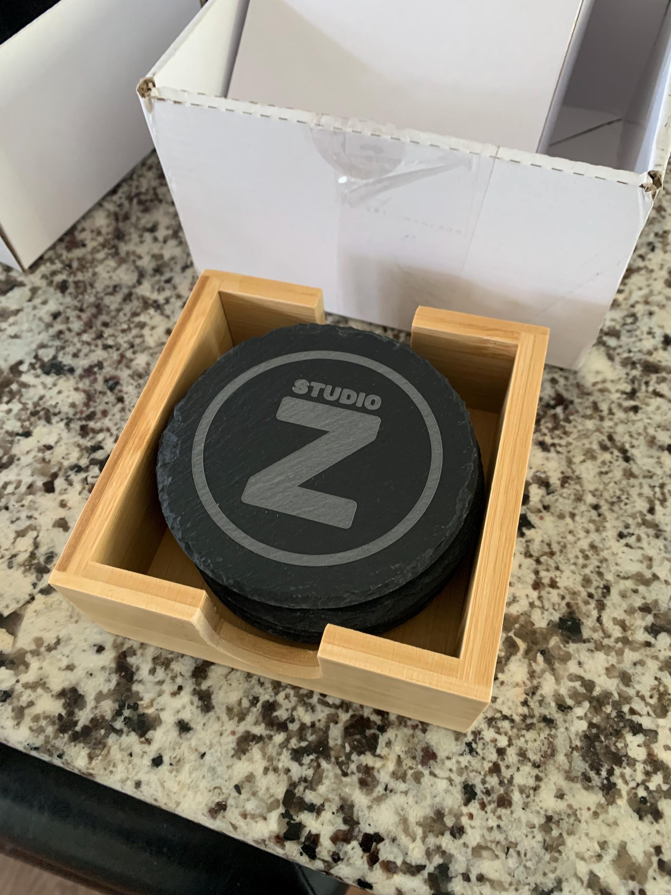 Customer photo of Set of 4 Custom Logo Engraved Slate Coasters with Bamboo Coaster Holder from zalexander13