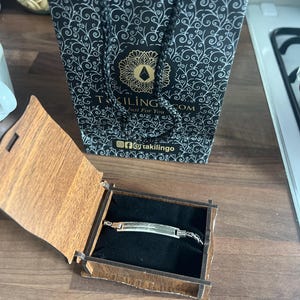 Alexandra added a photo of their purchase
