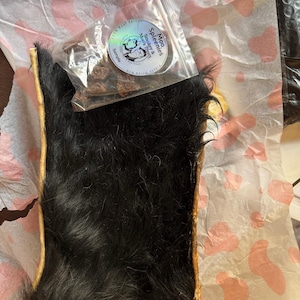 Kyla added a photo of their purchase