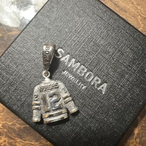 Ciondolo personalizzato per maglia da hockey, numero di maglia ...