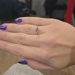 Sarah added a photo of their purchase