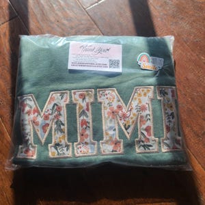 Amy added a photo of their purchase