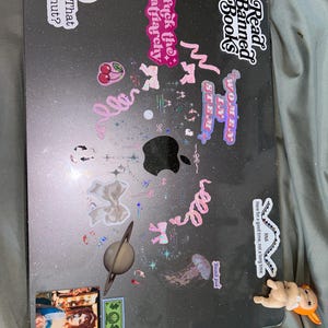 Taylor added a photo of their purchase