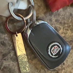 Gina added a photo of their purchase