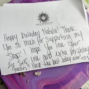 Natalie added a photo of their purchase