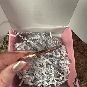 Isabella added a photo of their purchase