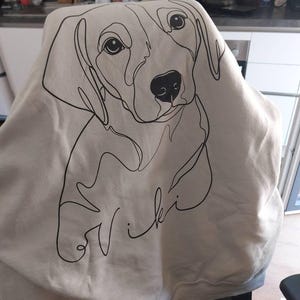 Lisa added a photo of their purchase