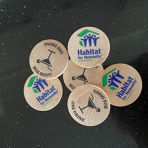 Customer photo of their custom wooden nickels