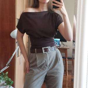 Dina added a photo of their purchase