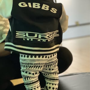 Aisha added a photo of their purchase