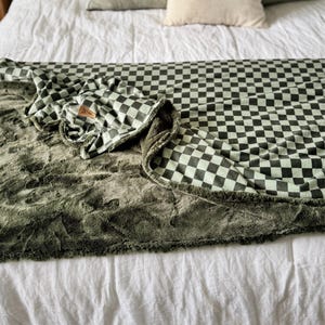 Sarah added a photo of their purchase