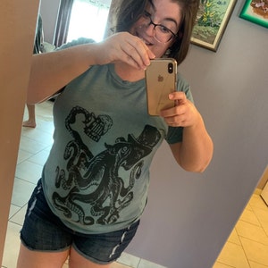 Cynthia added a photo of their purchase