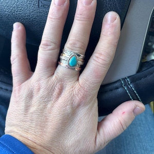 Sharon added a photo of their purchase