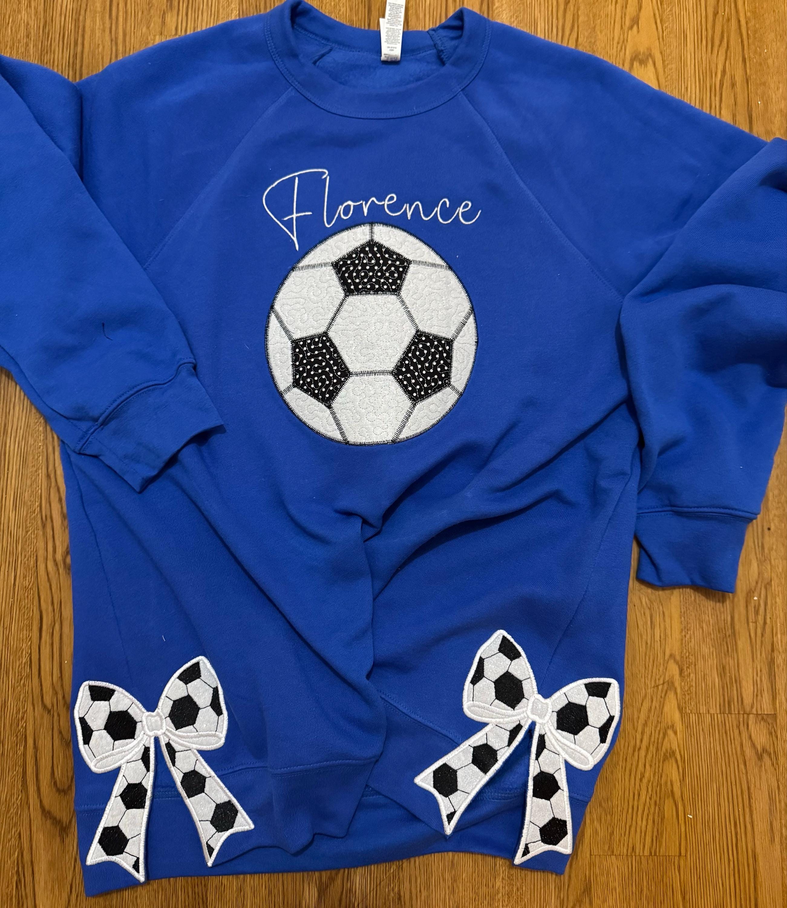 Customer project using Soccer Ball Side Seam Bow Applique embroidery design