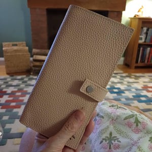 Angela added a photo of their purchase