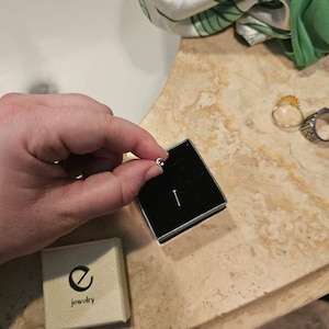 Samantha added a photo of their purchase