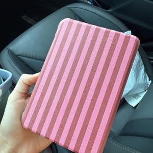 Ellison added a photo of their purchase