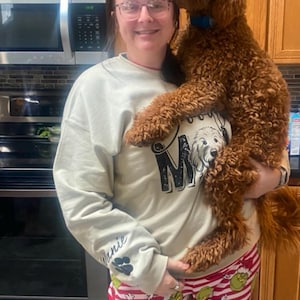 olivia added a photo of their purchase