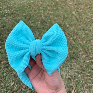 Adela added a photo of their purchase