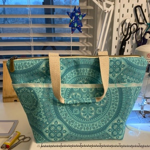 Maureen added a photo of their purchase