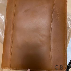 Beatriz added a photo of their purchase