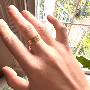 Customer photo from PhasesCo., Textured Yellow Gold Band 7mm