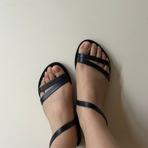 Angelica added a photo of their purchase
