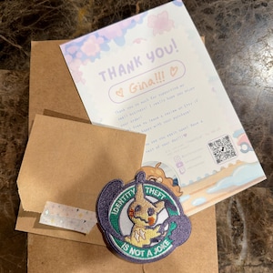 Gina added a photo of their purchase