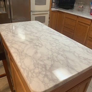 Jill added a photo of their purchase