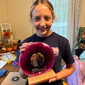 Samantha added a photo of their purchase