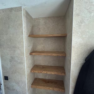 Gilles added a photo of their purchase