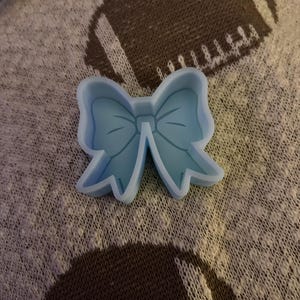 Priscilla added a photo of their purchase